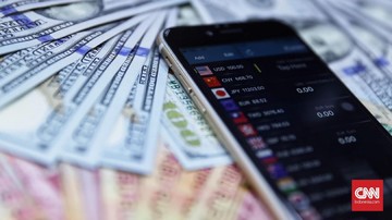 Nilai tukar rupiah berada di level Rp16.979 per dolar AS pada Jumat (27/12) sore. Mata uang Garuda melemah 75,5 poin atau 0,45 persen dari perdagangan sebelumnya. (Foto: CNN Indonesia/Hesti Rika)